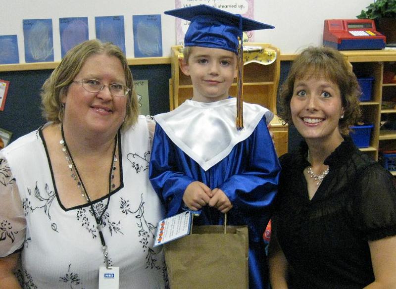 jvb grad 20-Aug-09 w his teachers.jpg